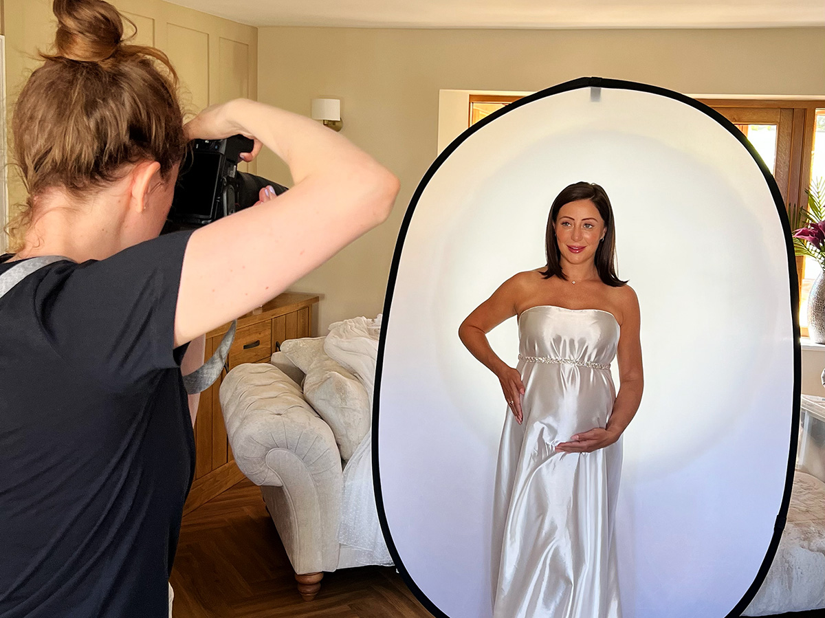Maternity photographer creating a professional pregnancy portrait during an at-home maternity photography session in Witham, Essex